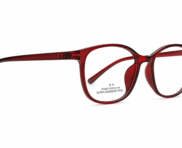 full-rim, oval-shaped eyewear frames in a translucent deep red/burgundy finish