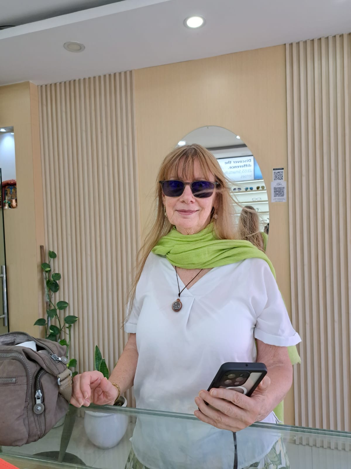 Canadian visitor wearing ZEISS prescription multifocal sunglasses at Vision Concern Boudha in Kathmandu